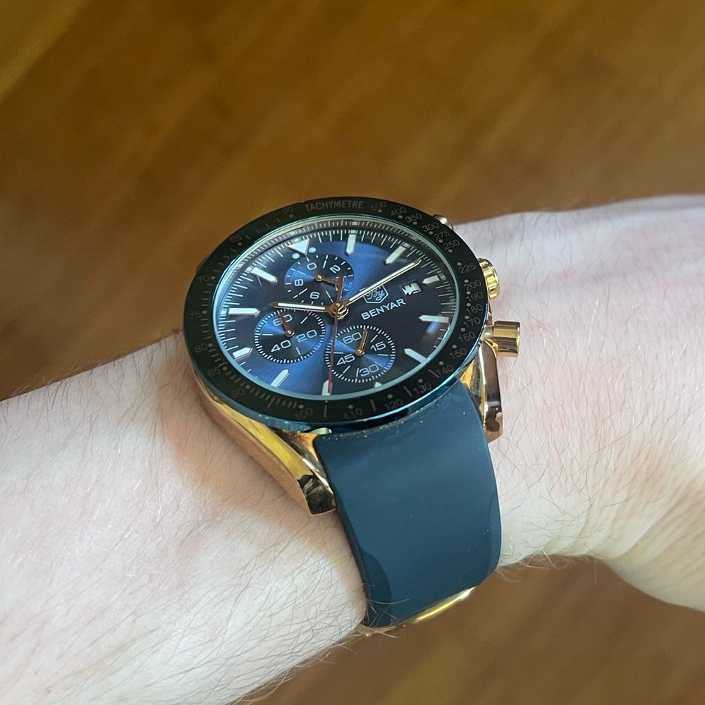 BENYAR Blue and rose gold watch.